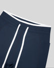 Closeup of the drawstring waistband on the TrackLine Contour Yoga Shorts in Navy Blue