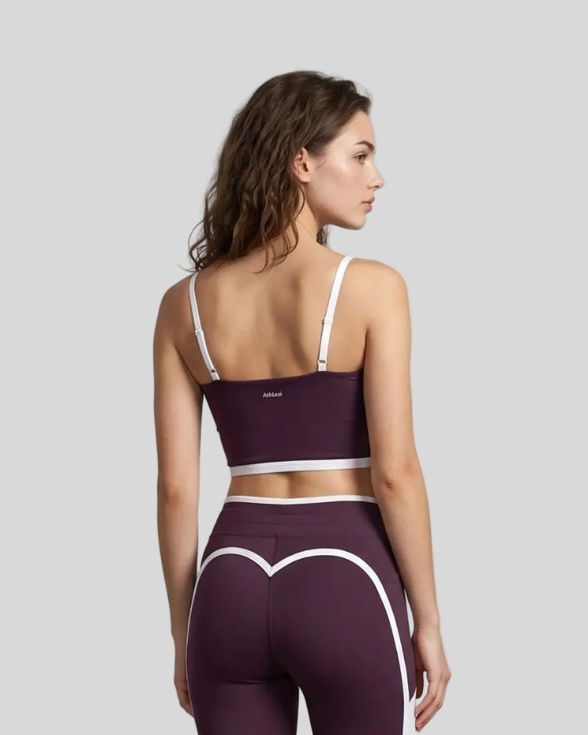 Model wearing the TrackLine Contour Yoga Sports Bra in Deep Purple, back view