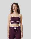Model wearing the TrackLine Contour Yoga Sports Bra in Deep Purple, front view
