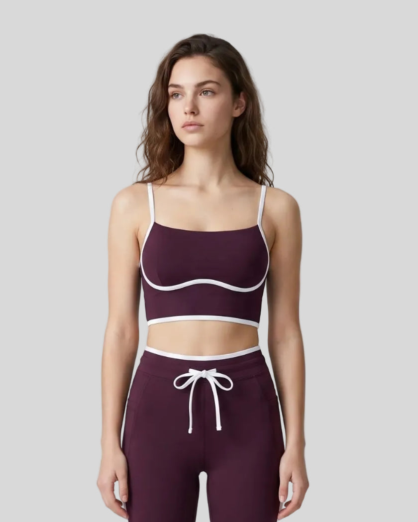 Model wearing the TrackLine Contour Yoga Sports Bra in Deep Purple, front view