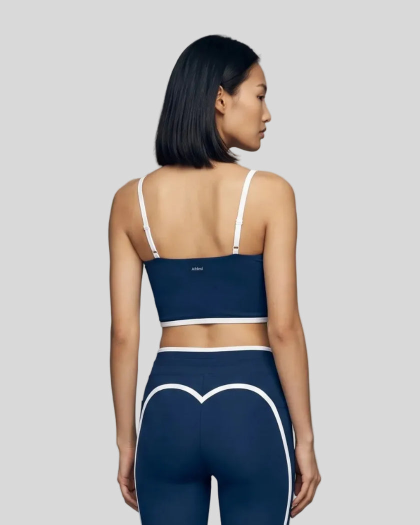 Model wearing the TrackLine Contour Yoga Sports Bra in Navy Blue, back view