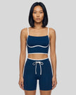 Model wearing the TrackLine Contour Yoga Sports Bra in Navy Blue, front view