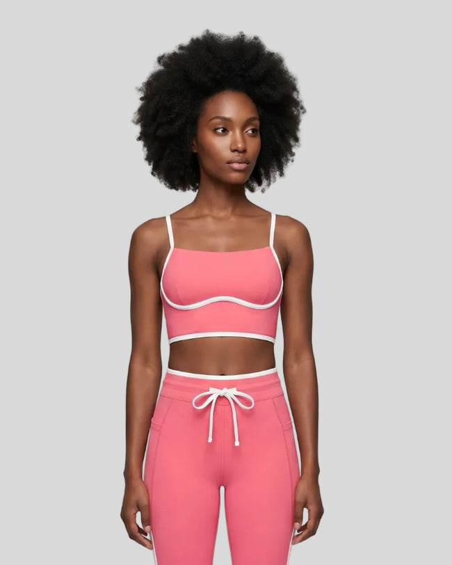 Model wearing the TrackLine Contour Yoga Sports Bra in Pink, front view