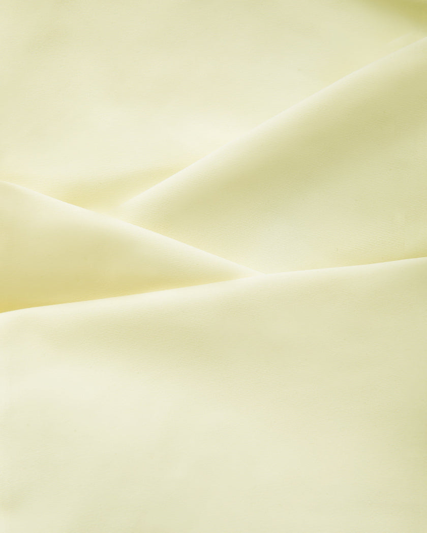 Closeup of the smooth stretch performance fabric used in the TrackLine Contour Yoga Sports Bra in White.