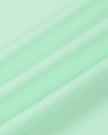 Performance stretch fabric detail of the TrackLine Court Polo in Mint Green.