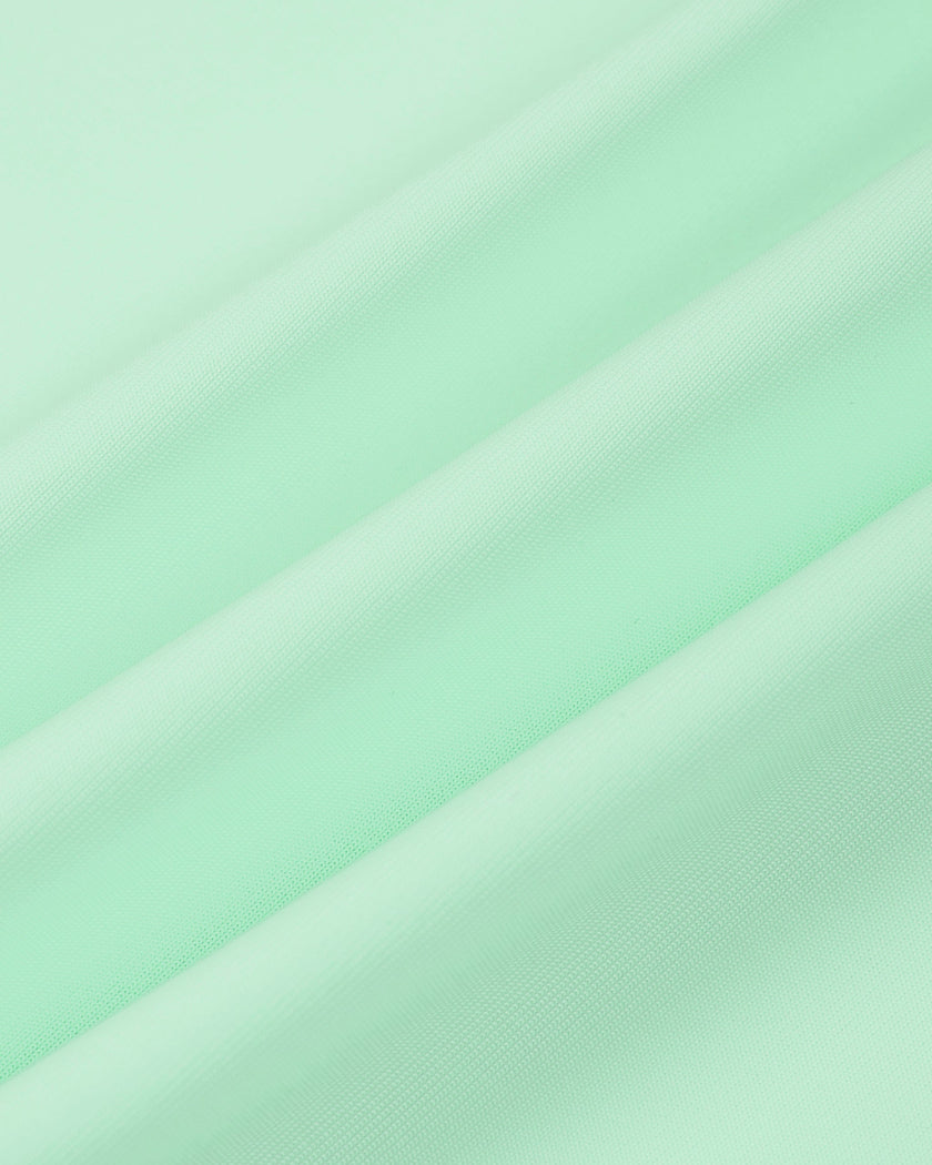 Performance stretch fabric detail of the TrackLine Court Polo in Mint Green.