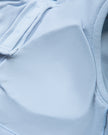 Interior chest padding detail of the TrackLine Court Polo Tank Top in Blue with White