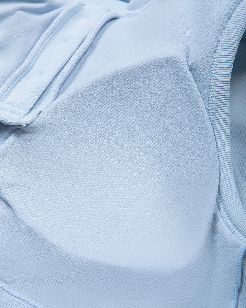 Interior chest padding detail of the TrackLine Court Polo Tank Top in Blue with White