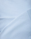Close-up of the ribbed stretch fabric used on the TrackLine Court Polo Tank Top in Blue with White