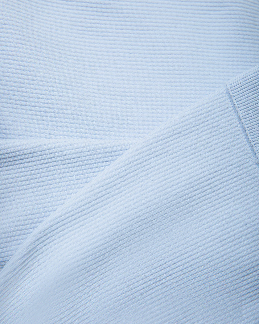 Close-up of the ribbed stretch fabric used on the TrackLine Court Polo Tank Top in Blue with White