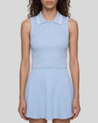 Model wearing the TrackLine Court Polo Tank Top in Blue with White viewed mid body from the front