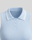 Close-up of the TrackLine Court Polo Tank Top collar with contrast stripe and button placket in Blue with White