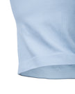 Close-up of the cropped waist hem on the TrackLine Court Polo Tank Top in Blue with White