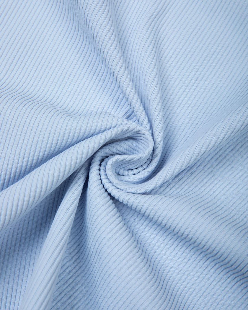 Second close-up of the soft ribbed stretch fabric used on the TrackLine Court Skirt in Blue