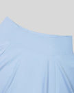 Close-up of the high-rise waistband on the TrackLine Court Skirt in Blue.