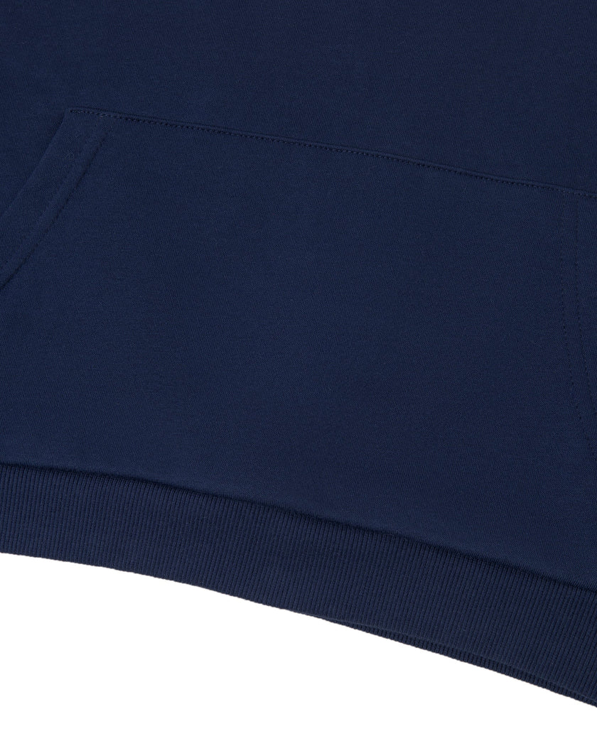 Bottom hem closeup of the Athlesi TrackLine Cropped Hoodie in blue