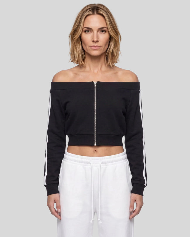 Upper body front view of woman wearing TrackLine Edge Jacket zipped closed in Black