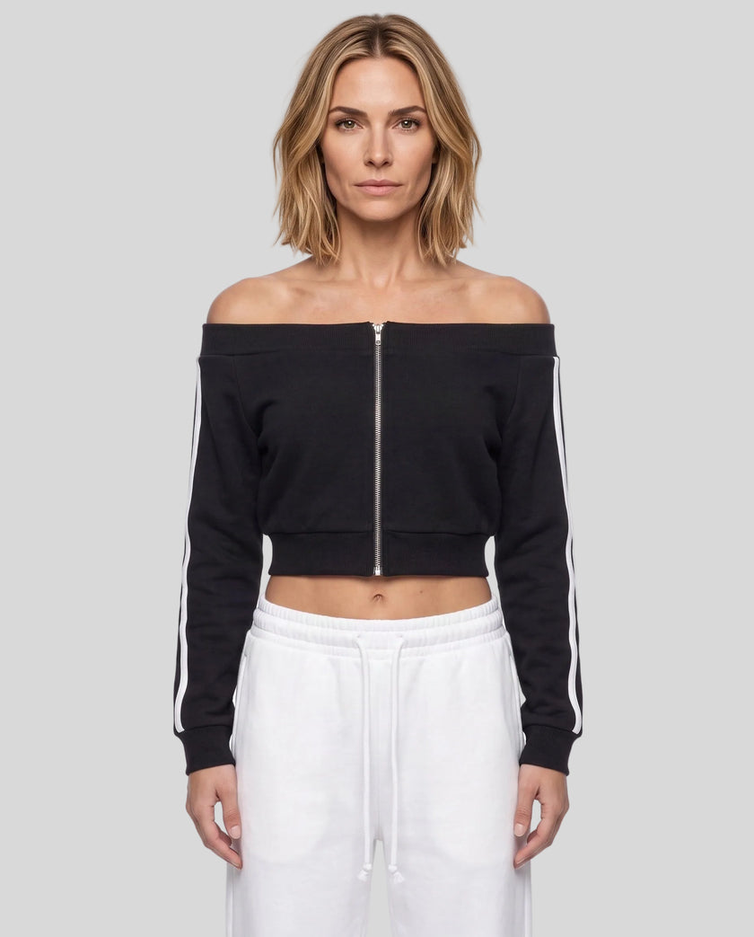 Upper body front view of woman wearing TrackLine Edge Jacket zipped closed in Black