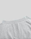 Closeup of wide ribbed off-shoulder neckline from the back on TrackLine Edge Jacket