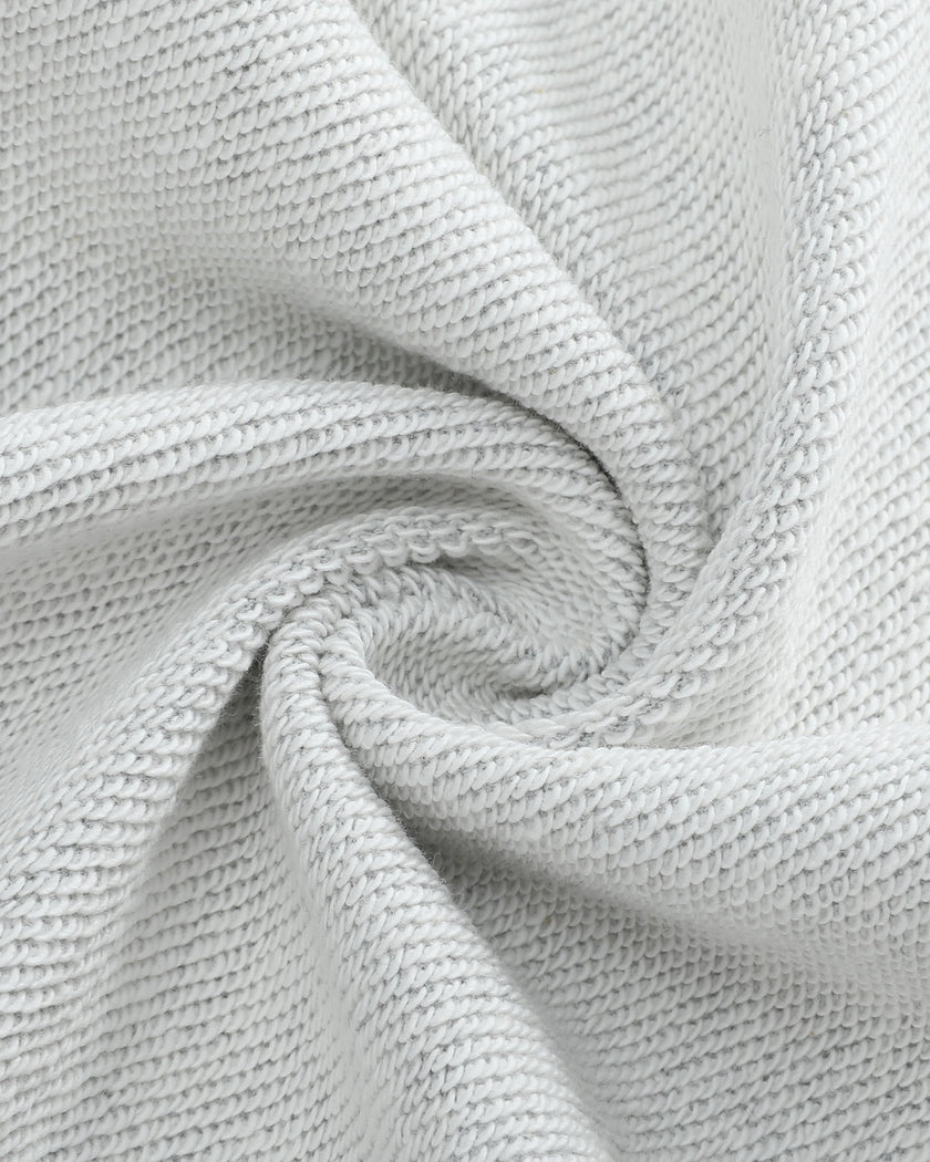 Detailed view of cotton-blend fabric and contrast red trim on TrackLine Edge Jacket