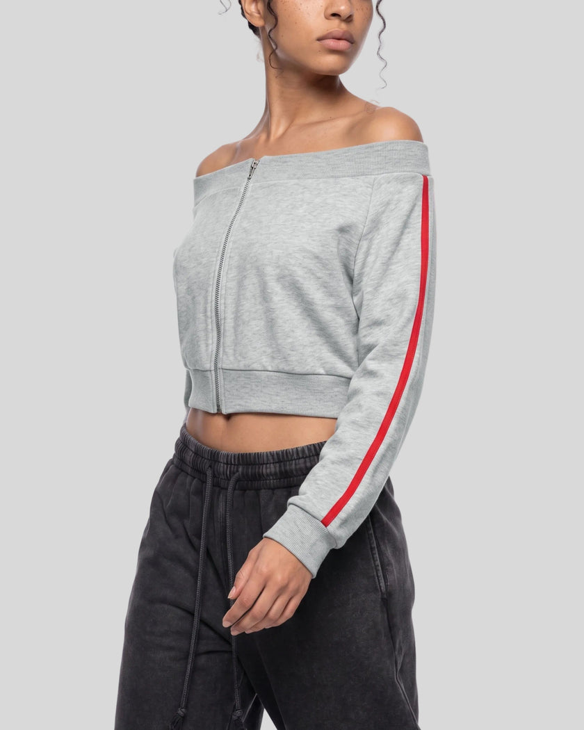 Upper body front angle view of woman wearing TrackLine Edge Jacket in Flower Gray