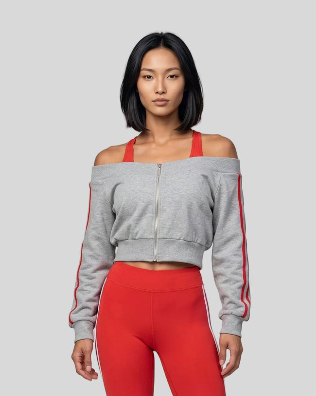 Upper body front view of woman wearing TrackLine Edge Jacket zipped closed in Flower Gray