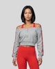 Upper body front view of woman wearing TrackLine Edge Jacket zipped closed in Flower Gray