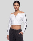 Upper body front view of woman wearing TrackLine Edge Jacket semi-open in White