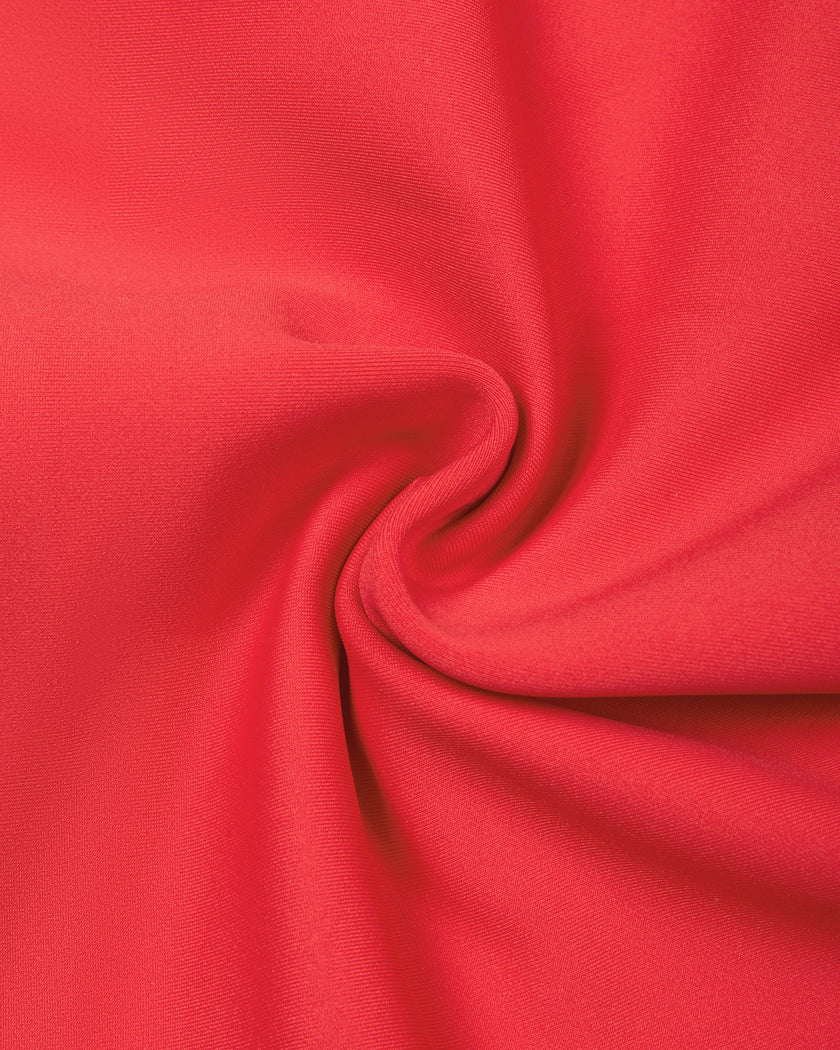 Detailed view of the stretch knit and white contrast stripe on the Athlesi TrackLine Edge Leggings in red