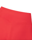 Close-up of the high-rise waistband and V-shaped back seam on the Athlesi TrackLine Edge Leggings in red