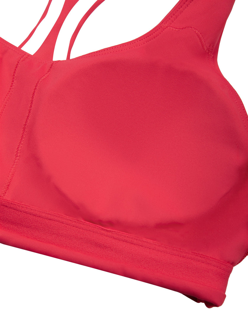 Close-up of the chest padding construction on the Athlesi TrackLine Edge Sports Bra in red