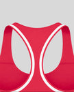 Close-up of the racerback and white contrast binding on the Athlesi TrackLine Edge Sports Bra in red