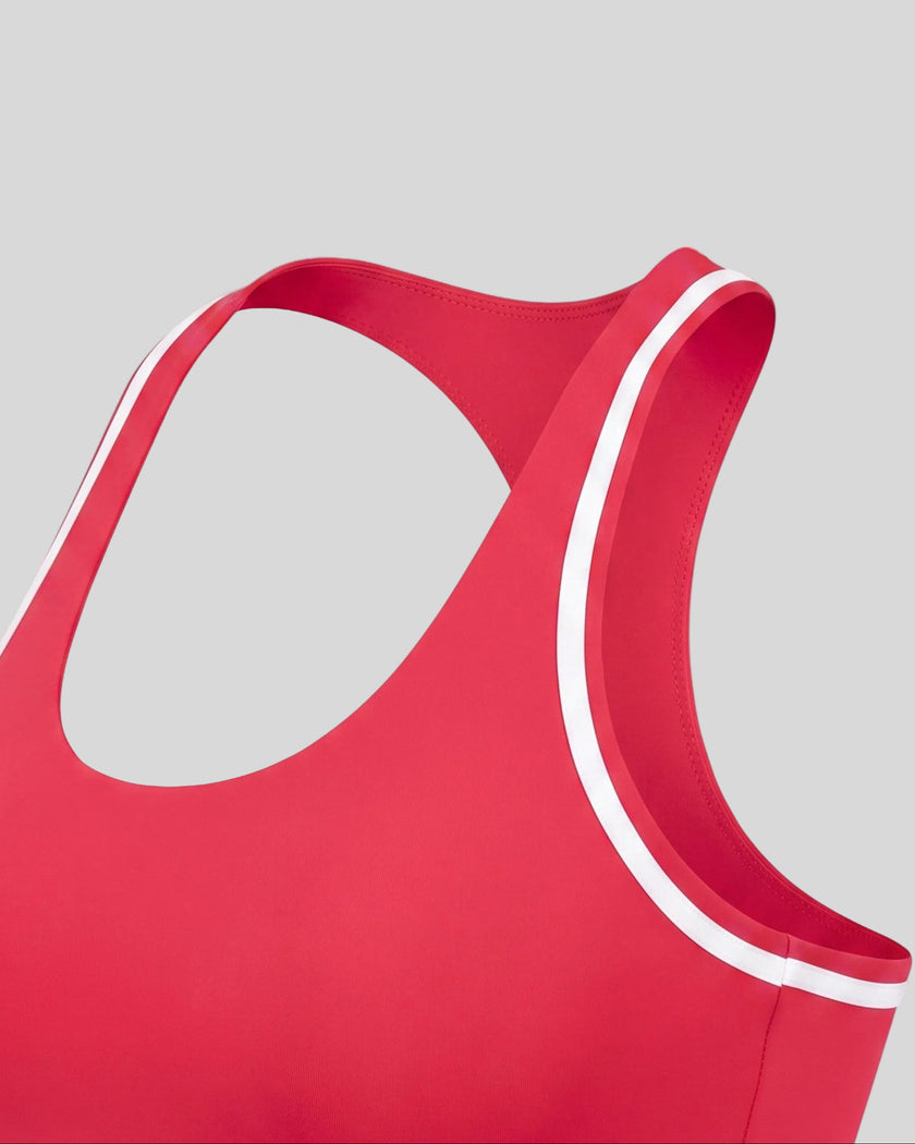 Side angle close-up of the Athlesi TrackLine Edge Sports Bra in red with white contrast trim