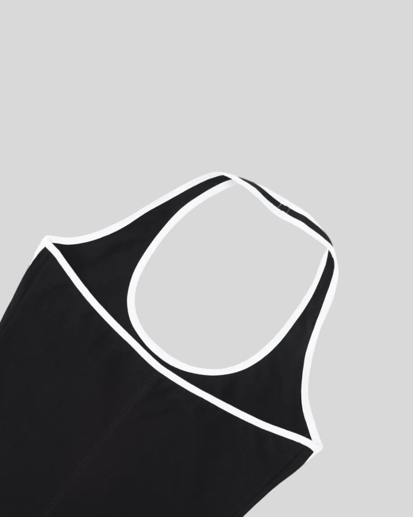 Back neckline detail closeup of the Athlesi TrackLine Halter Dress in black