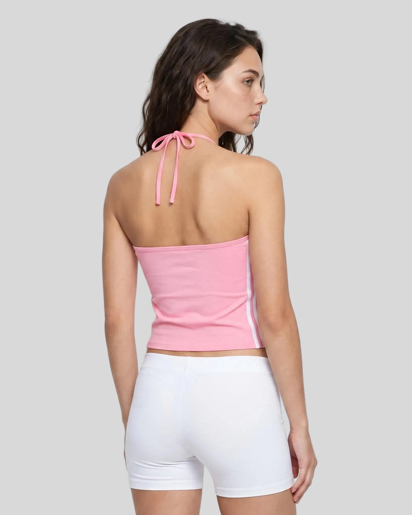 Back view of a woman wearing the Athlesi TrackLine Halter Tank in pink and white