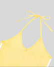 Back halter tie detail closeup of the Athlesi TrackLine Halter Tank in yellow and white