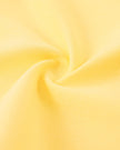 Detailed fabric texture closeup of the Athlesi TrackLine Halter Tank in yellow and white