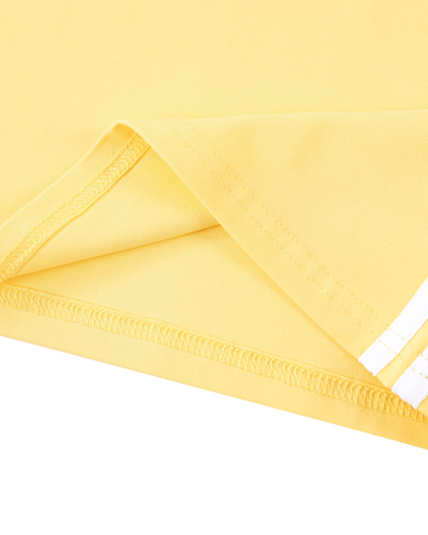 Bottom hem detail closeup of the Athlesi TrackLine Halter Tank in yellow and white