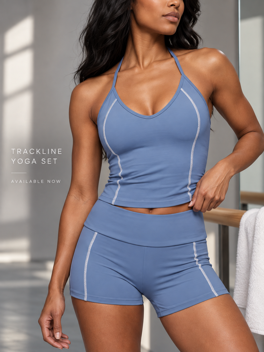 Closer look of a woman wearing TrackLine Halter Yoga Top with matching TrackLine Yoga Shorts in blue