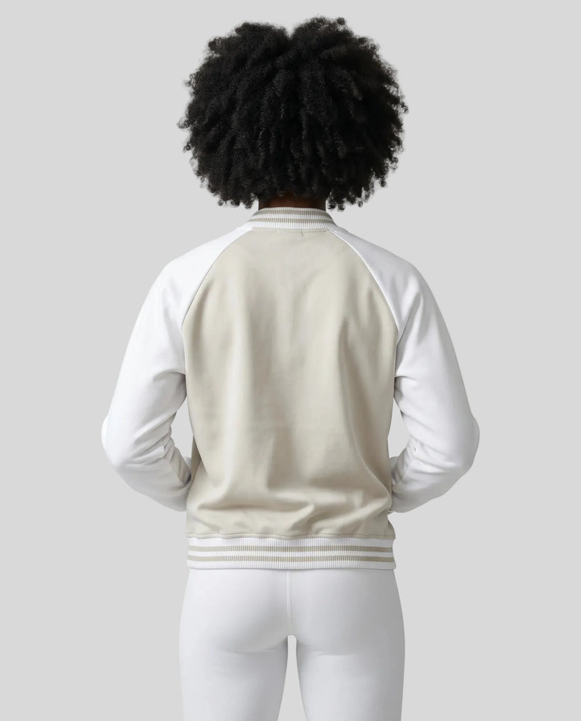 Model wearing TrackLine Heritage Jacket in Beige Camel with White back view