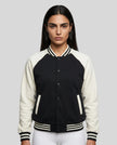 Model wearing TrackLine Heritage Jacket in Black with Apricot front view