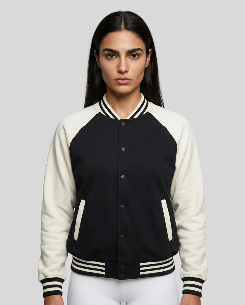 Model wearing TrackLine Heritage Jacket in Black with Apricot front view