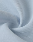 Cotton blend fabric texture detail of TrackLine Heritage Jacket in Light Blue with Apricot