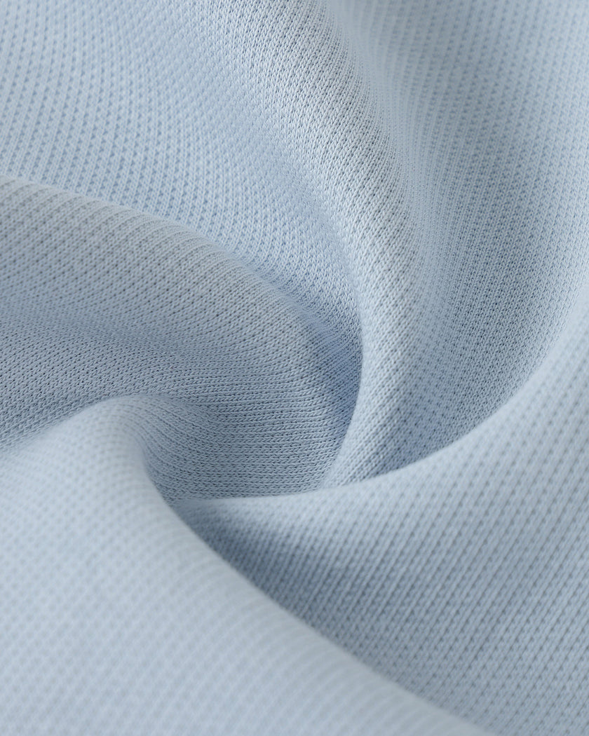 Cotton blend fabric texture detail of TrackLine Heritage Jacket in Light Blue with Apricot