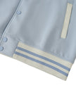 Striped waistband and snap button detail of TrackLine Heritage Jacket in Light Blue with Apricot