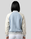 Model wearing TrackLine Heritage Jacket in Light Blue with Apricot back view