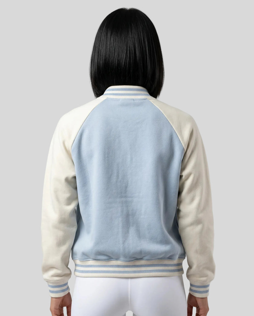 Model wearing TrackLine Heritage Jacket in Light Blue with Apricot back view