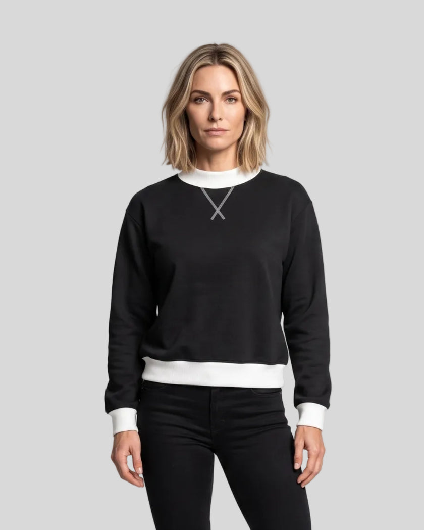 Model wearing the Athlesi TrackLine Heritage Sweatshirt in black with white contrast trim, front view