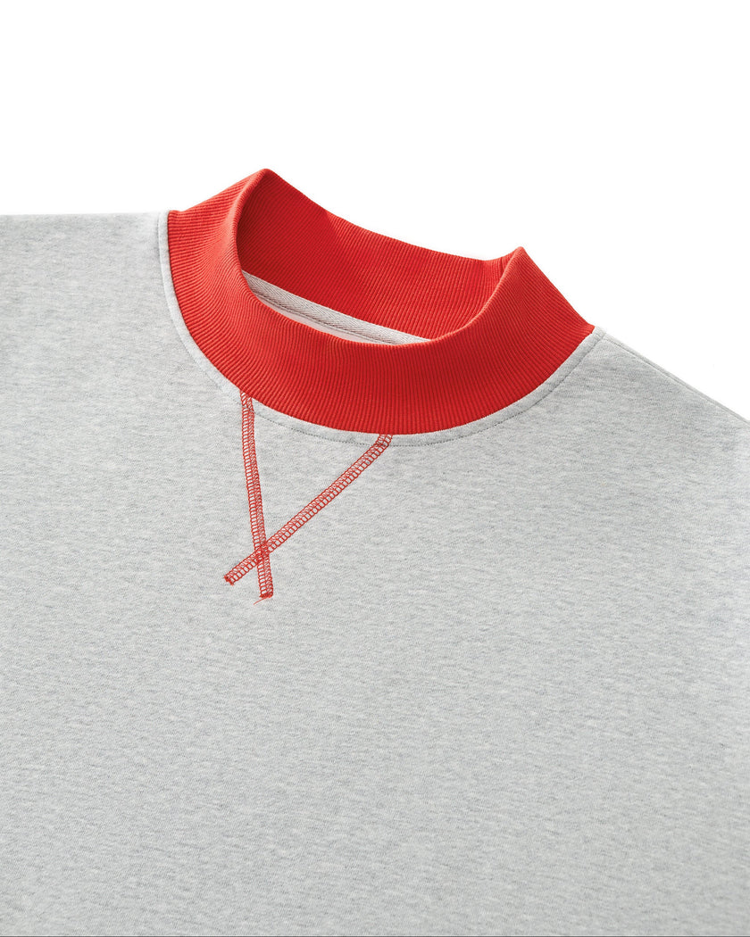 Close-up of the red ribbed neckline and stitched V-detail on the flower gray Athlesi TrackLine Heritage Sweatshirt