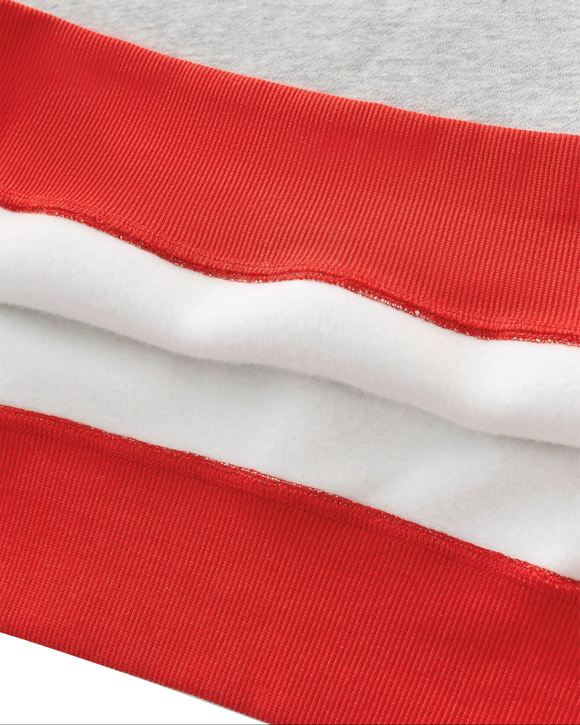 Close-up of the red ribbed hem on the flower gray Athlesi TrackLine Heritage Sweatshirt